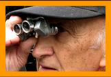 Old Man Looking Through Binoculars.
Man observing with binoculars.
Man using binoculars.
Homme observant avec des jumelles.
Mann beobachtet mit einem fernglas.
Hombre observando con binoculares 
Hombre usando prismaticos.
Man observerar med kikare.
L'uomo osserva con il binocolo.
Man met verrekijker.
Man som bruker kikkert.
Czlowiek za pomoca lornetka.
Muz pouzvajici dalekohled.
Mand burger en kikkert.
Ember tavcsovet hasznal.
Mies kayttaa kiikareita.
Homem usando binoculos.
Cilveks kas izmanto binokli.
Vyras naudodamas ziuronus.
