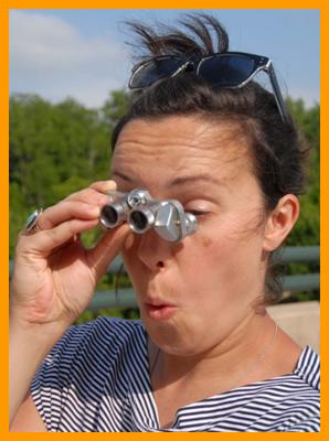 Surprised Woman looking through  Binoculars.
Woman using binoculars.
Woman with binoculars.
Frau schaut durch ein fernglas.
Frau mit fernglas.
Femme regardant travers de jumelles.
Femme utilisant de jumelles.
Mujer mirando a traves de binoculares
Mujer usando  prismaticos.
Kvinna som tittar genom kikare.
Donna che usa il binocolo.
Vrouw met verrekijker.
Kvinne som bruker kikkert.
Kobieta za pomoca lornetki.
Muz pouzvajici dalekohled.
Kvinde de burger en kikkert.
No hasznal tavcsovet.
Nainen kayttaa kiikareita.
Mulher usando binoculos.
Sieviete kas izmanto bimokli.
Moteris besinaudojanti ziuronais.
Donna che guarda attraverso il binocolo.