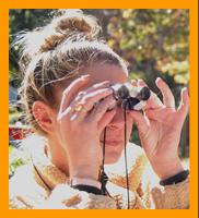 Woman Viewing with Miniature Binoculars