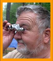 Surprised Man with Small Binoculars.
Man looking through binoculars.
Man using binoculars.
Homme utilisant de jumelles.
Man mit  fernglas.
Hombre usando binoculares.
Hombre usando prismaticos.
Man som anvander kikare.
Man som bruker kikkert.
Czlowiek za pomoca lornetki.
Muz pouzvajici dalekohled.
Mand burger en kikkert.
Ember tavcsovet hadznal.
Mies kayettaa kiikareita.
Homem usando binoculos.
Cilveks kas izmanto binokli.
Vyras naudodaqmas  ziuronus.
双眼鏡を持つ男
拿著望遠鏡的男人
쌍안경을 든 남자
दूरबीन वाला आदमी
Человек с биноклем
Άνδρας με κιάλια
رجل يحمل منظار
איש עם משקפת

